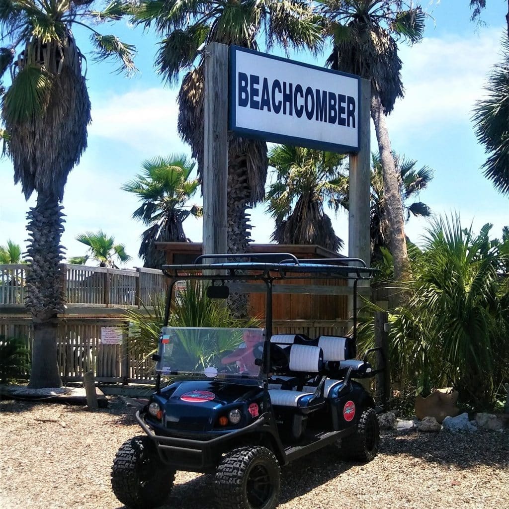 Golf cart rental in front of Beachcomber Motel in Port Aransas